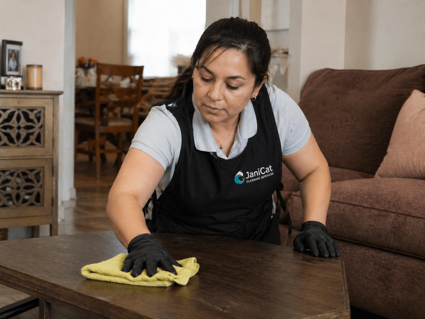 Janicat team member preparing an Airbnb living room in Seattle